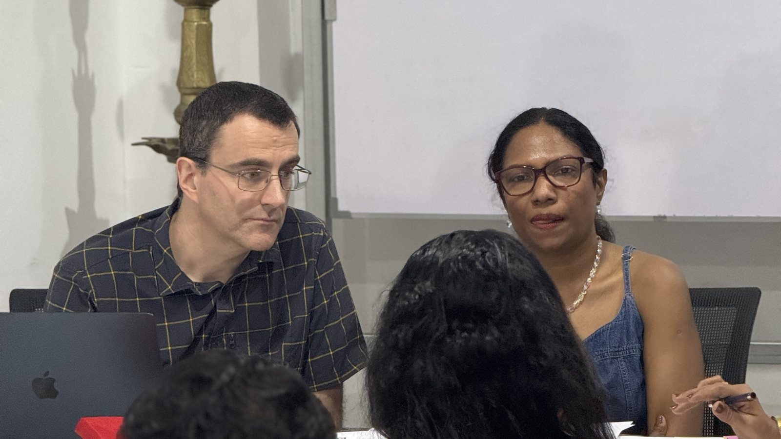 MALIROSA founders in consultation with students